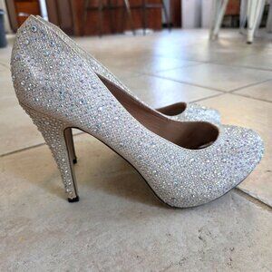 Women's size 8 Eye Candie silver sparkle high heels